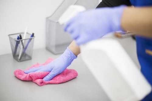 Professional commercial cleaning team maintaining a business lobby