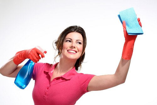 Technician handling a delicate rug during professional rug cleaning